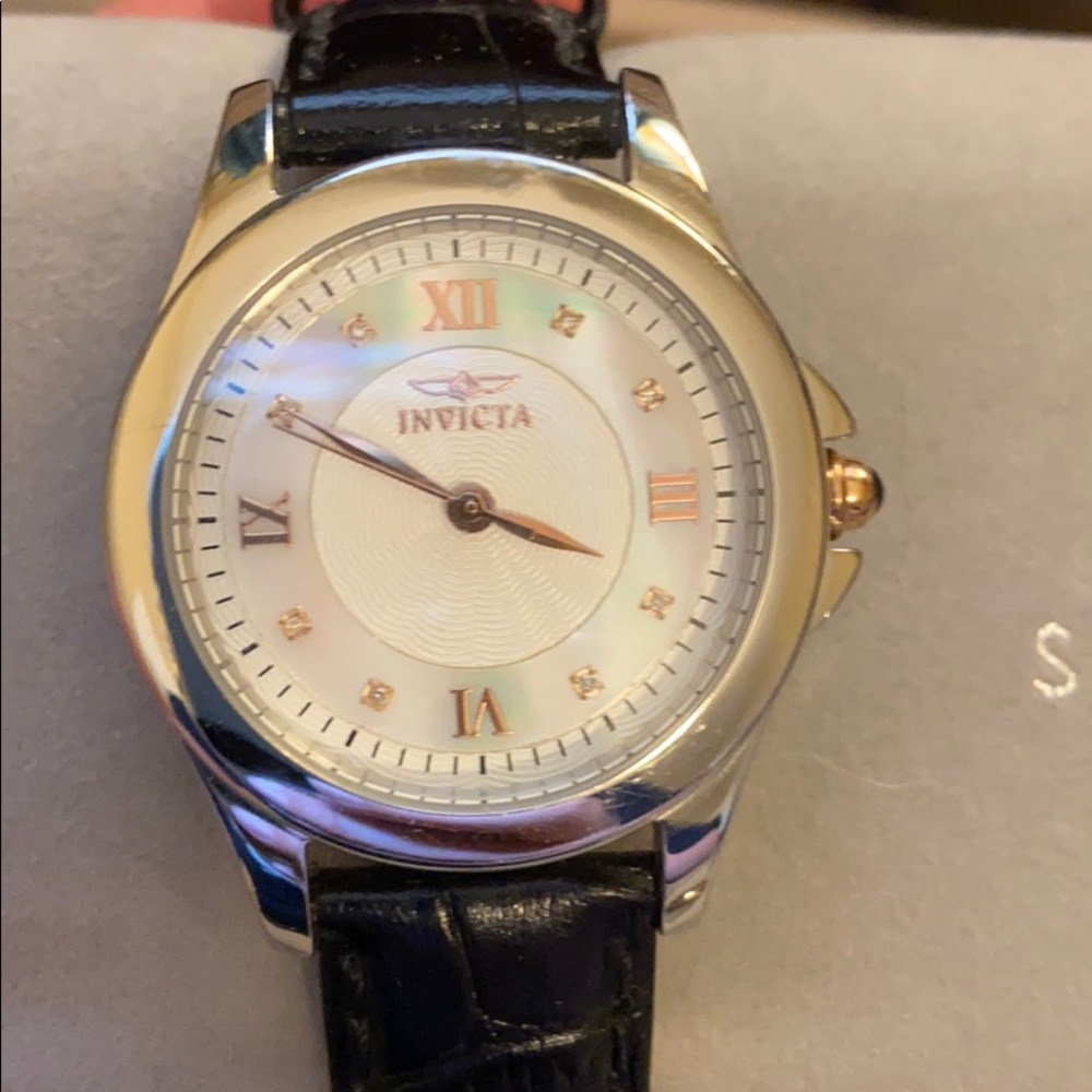 Invicta mother of pearl face watch